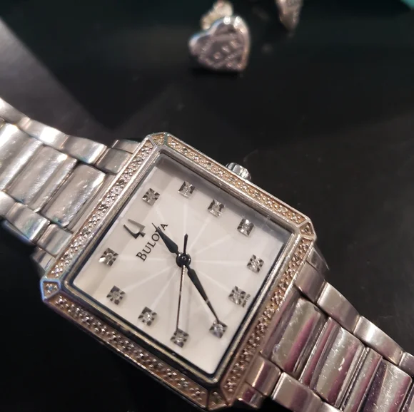 Bulova woman's watch & Tiffany &Co earings